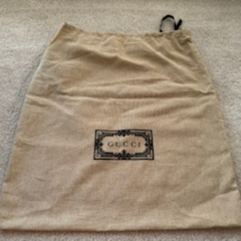 New Gucci dust bag- never been used. Pet & smoke free environment, no odor.